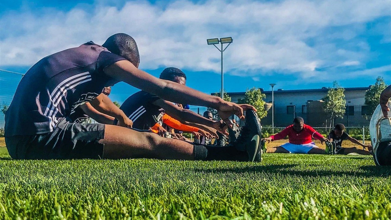 Men playing sport at the Phakama Community Centre
